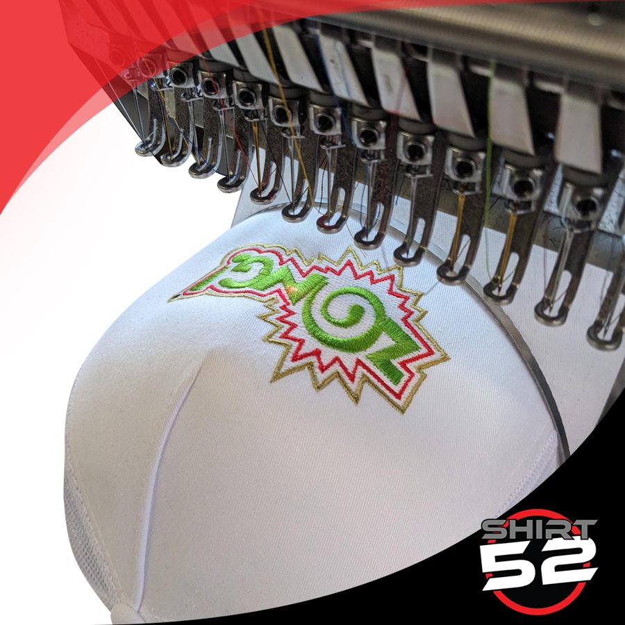 Hat being embroidered on a multi-head machine