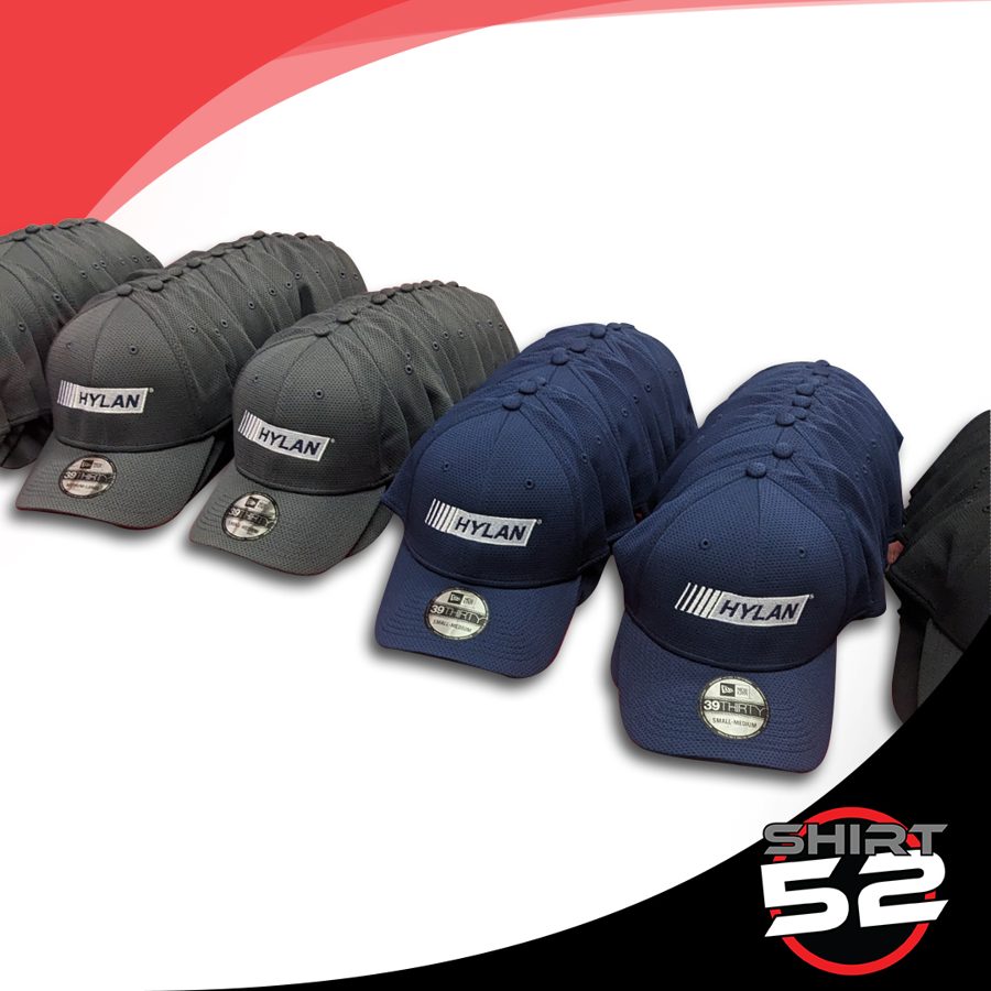 Embroidered company hats in gray and navy